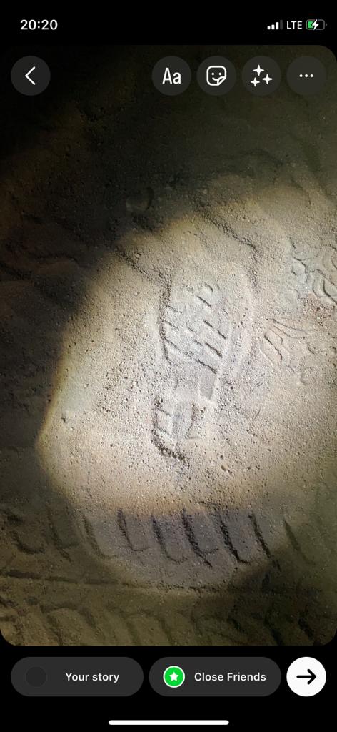Night training grounds with footprints